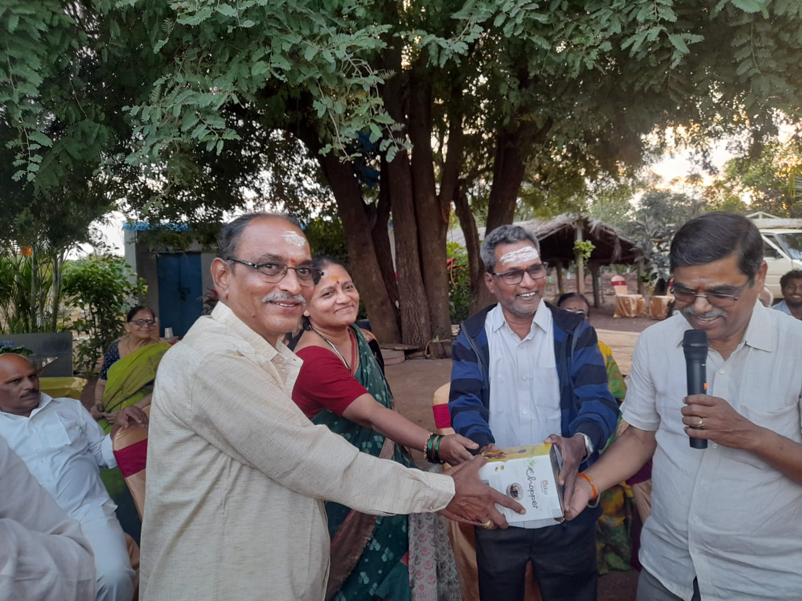 Maruthi Ram Garu along with his wife receiving First prize in singing compitition (Men) in get-together party on 22-11-2023.